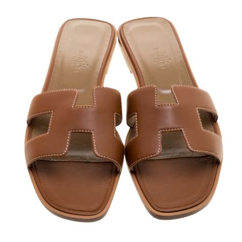 hermes flat tan sandals|Hermes snakeskin sandals.